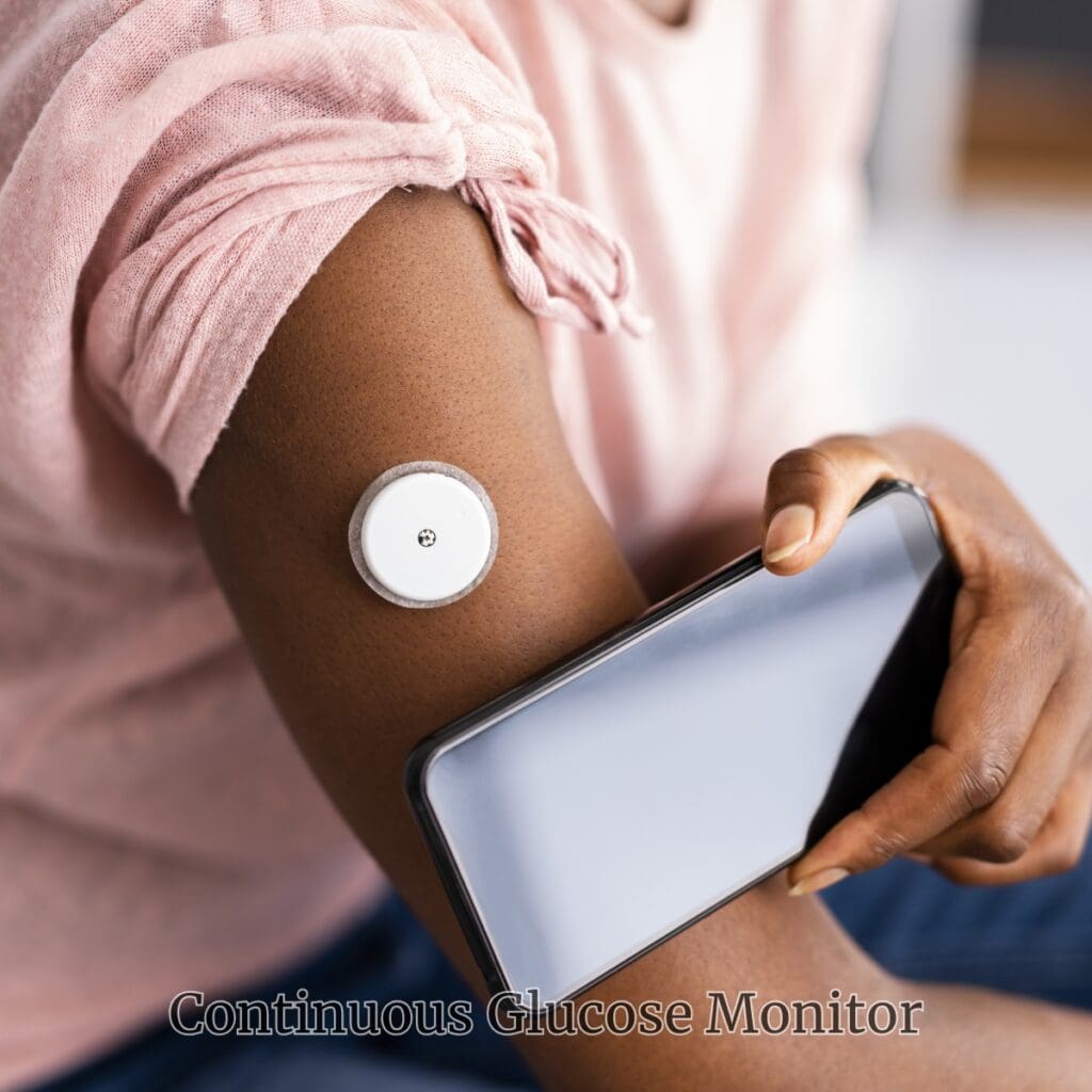 An image of someone scanning a continuous glucose monitor with a smart phone.